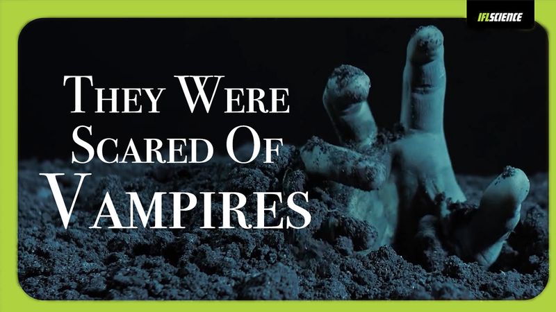 A hand emerges from the grave