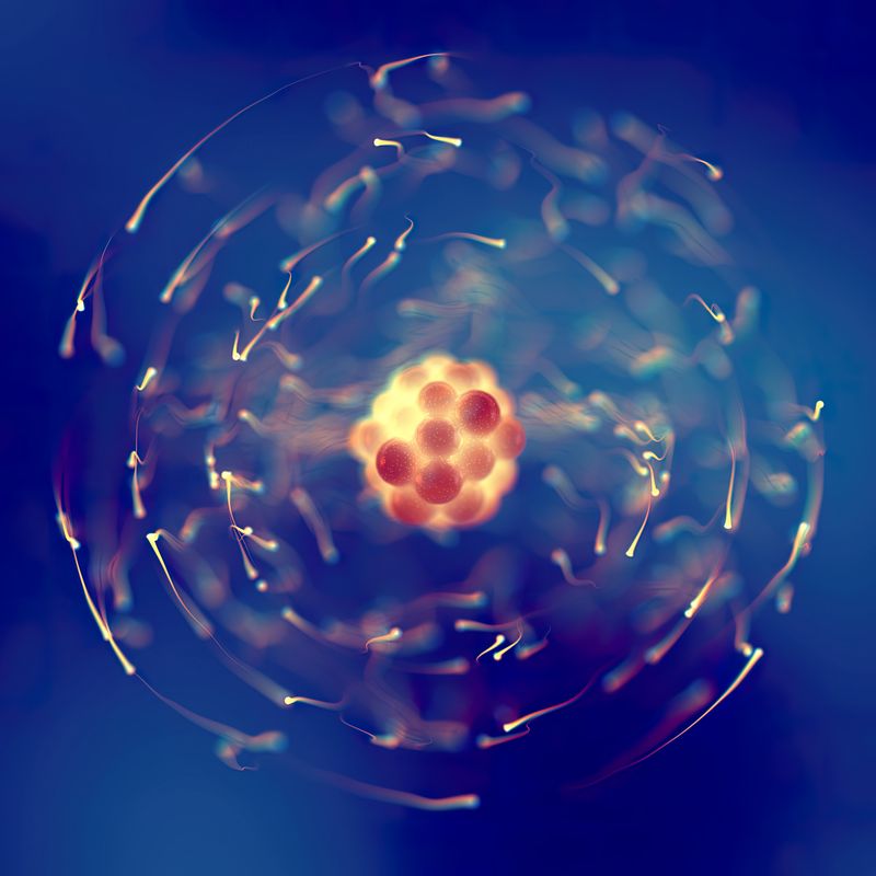 artist impression of an atom with swirling electrons around