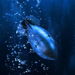 A digital photo showing an old fashioned nuclear bomb falling through a dark watery background suggesting it is heading towards the ocean floor. The bomb has the classic fish shape and is slightly obscured by bubbles.  