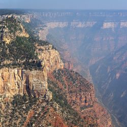 Smoke from the Dragon Bravo Fire in the Grand Canyon National Park around Oaz Butte and Widforss Point on the left, plus Transept Canyon on the right.