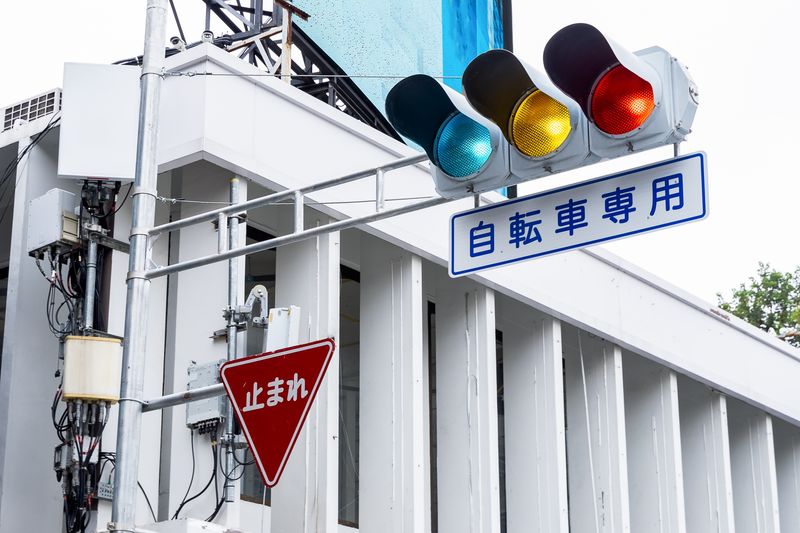 Blue Traffic Lights in Japanese street, Japan.