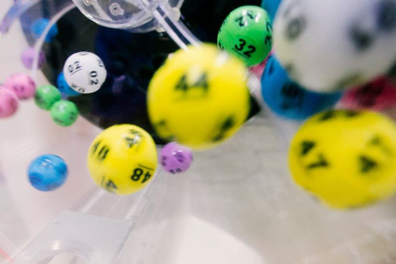 Lotto balls in a machine, brightly colored ball with numbers on