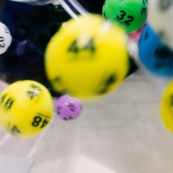 Lotto balls in a machine, brightly colored ball with numbers on