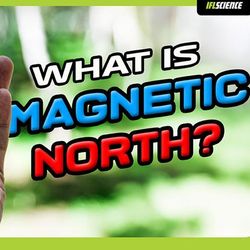 A man holding a compass