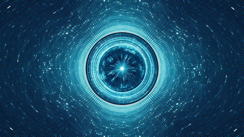 abstract digital art showing concentric circles at the end of a tunnel of tiny tiles with a bright point of light at the end.