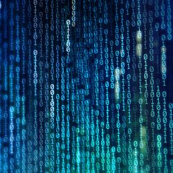 strings of vertical binary numbers in shades of blue on a dark background