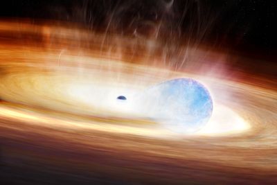 artost mpression of a small black hole ripping apart a star as they are both surrounded by a disk of material