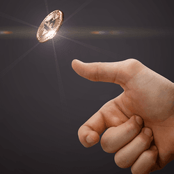 A hand tosses a coin into the air.