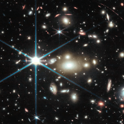 Earendel seen in the edge of this photo, top center in the smeared red line.