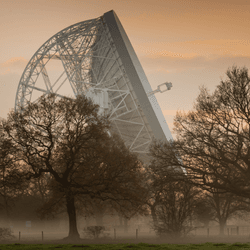 green bank observatory giant dish beyond the trees