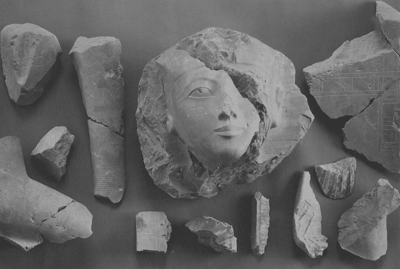 Fragments recovered from an indurated limestone statue of Hatshepsut.