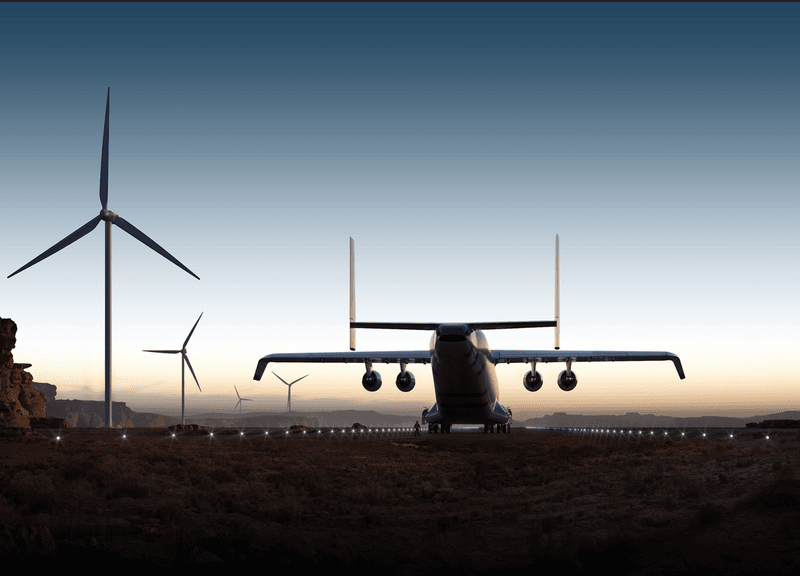 A rendering of the Windrunner aircraft driving into the sunset with windturbines.